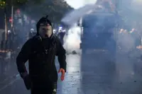 Thousands march in Albanian capital as anti-government protests spread