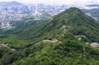Seoul mountain trail behind the presidential Blue House reopens after being closed for nearly 60 years