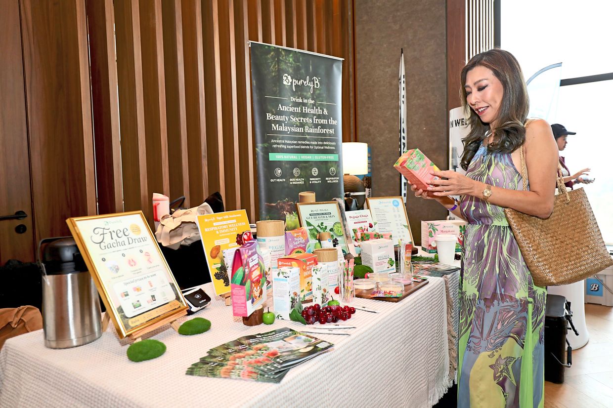 A marketplace offering services and products like spa packages at the event in Kuala Lumpur.