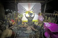 Keeping wayang kulit from fading into the shadows
