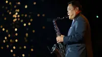 Anutin plays saxophone to welcome IMF and World Bank delegates, promotes Thai culture