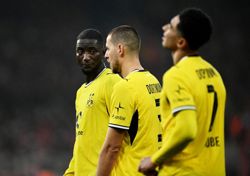 Soccer-Dortmund slip up with goalless draw at Union, Karetsas injured