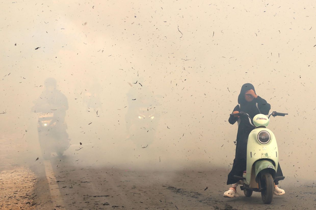 Indonesians worried over haze back home
