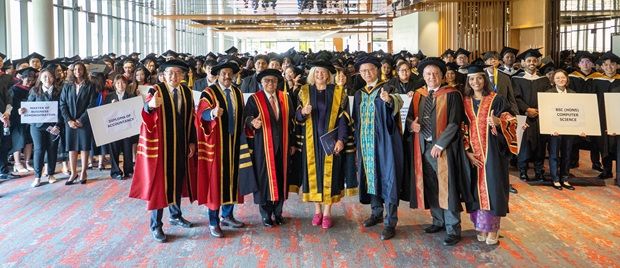 Successful milestone: (In front, from left) Peninsula Higher Education president Tung Chee Kuan, Edward, Yayasan PKT patron and independent trustee Tun Ahmad Fuzi Abdul Razak, Marchant, Tio, Peninsula Higher Education advisor Ian Pashby and Peninsula College Shah Alam director Cathy Edwards celebrate Peninsula College Shah Alam’s 27th Convocation Ceremony with graduates.