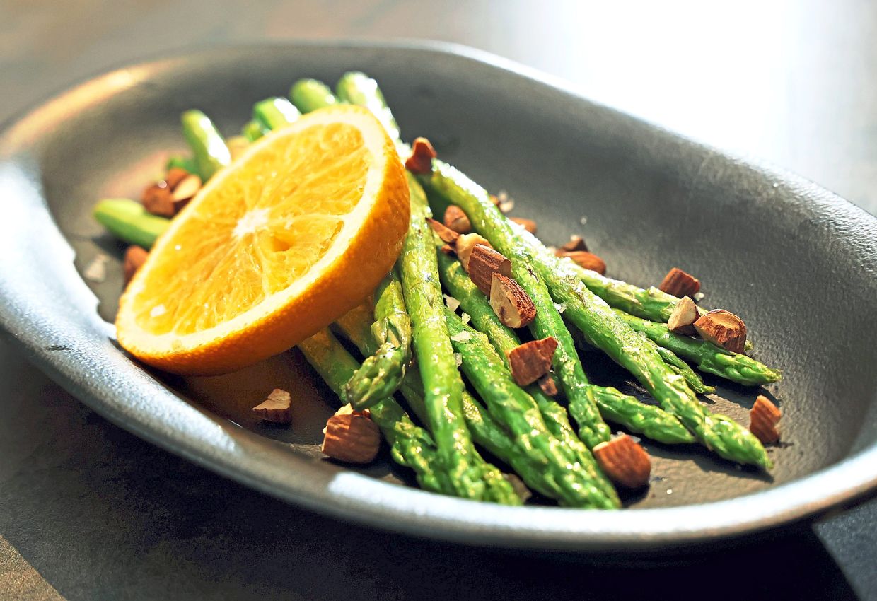 The charred asparagus is a simple, uncomplicated dish that hinges on beautifully burnished, blistered asparagus.