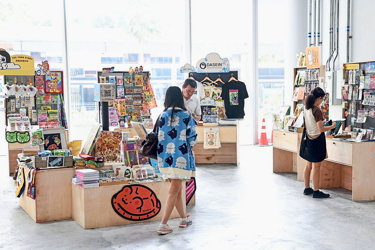 Visitors have room to browse at Offset Store, which features work by 20 artists from KLIF. Photo: The Star/Azman Ghani 