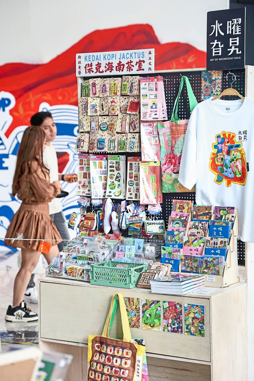 A selection of patches, stickers, prints and trinkets. Photo: The Star/Azman Ghani 