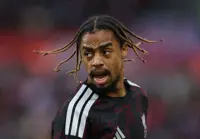 Soccer-Barcola shines as Liverpool labour to 2-1 win over Brentford