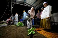 Border control officer's remains laid to rest in Kelantan