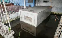 Floodwaters submerge graves in South Cotabato cemetery ahead of Undas