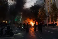 'Record' 855 people arrested over Paris protest violence: police