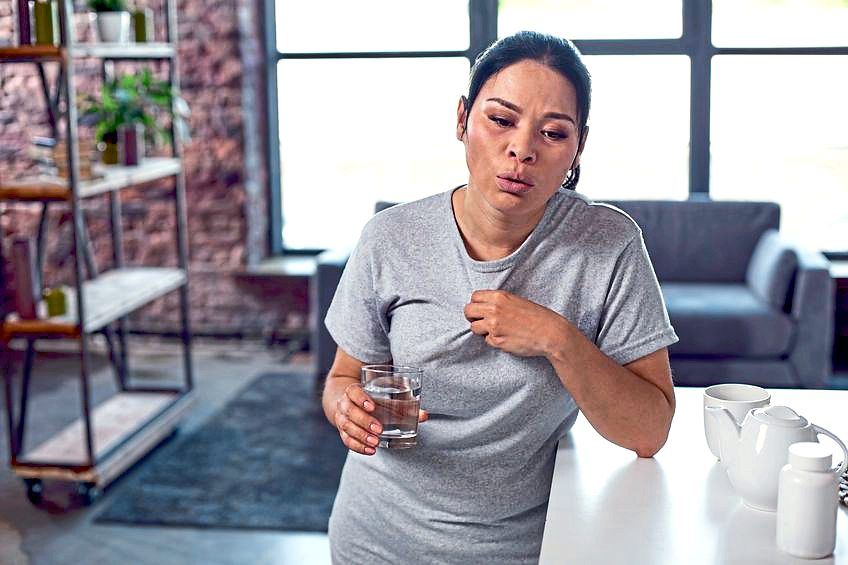 Hot flushes are a common symptom during the menopausal transition and for most women, do eventually go away. — 123rf