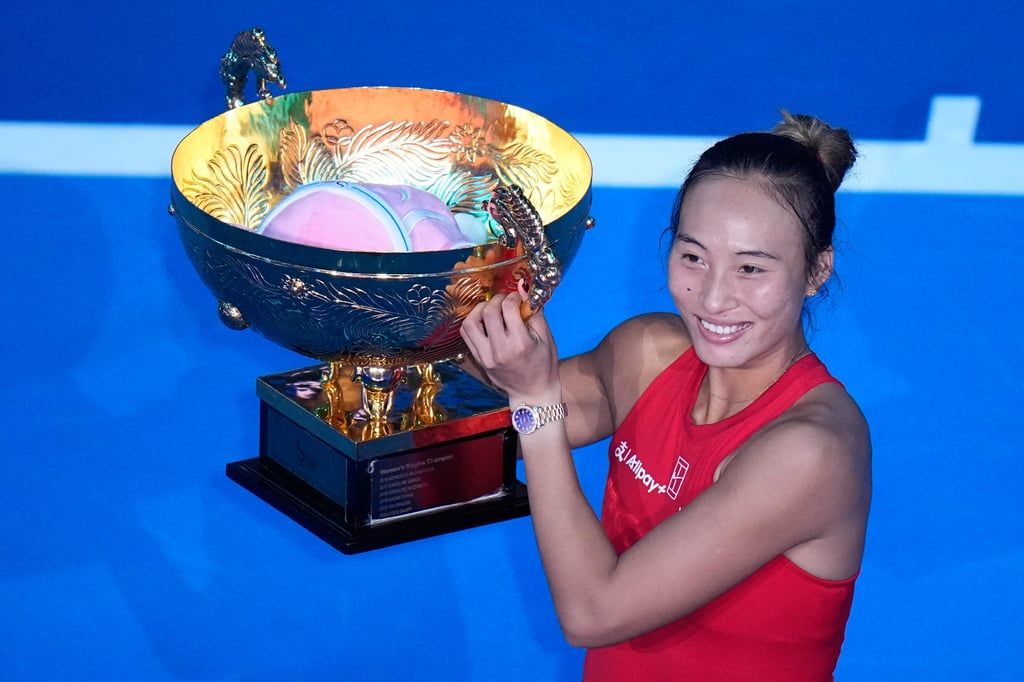 Zheng Qinwen makes history as the first-ever Chinese champion and wild card to win the China Open women’s singles title, beating Russia’s Mirra Andreeva. -- Photo: AP/Andy Wong