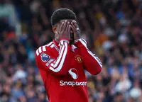 Soccer-Man United show fight but familiar flaws remain in Leeds draw