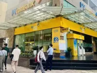 Vietnam's central bank urges rate cuts by commercial banks