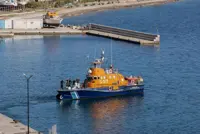 Twelve migrants, including infant, drown as boats capsize off Greek islands