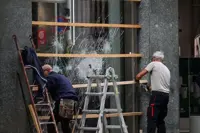Italian police detain hundreds as stores looted in weekend unrest in Milan