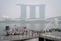 Singapore vows tougher legal action against companies linked to haze