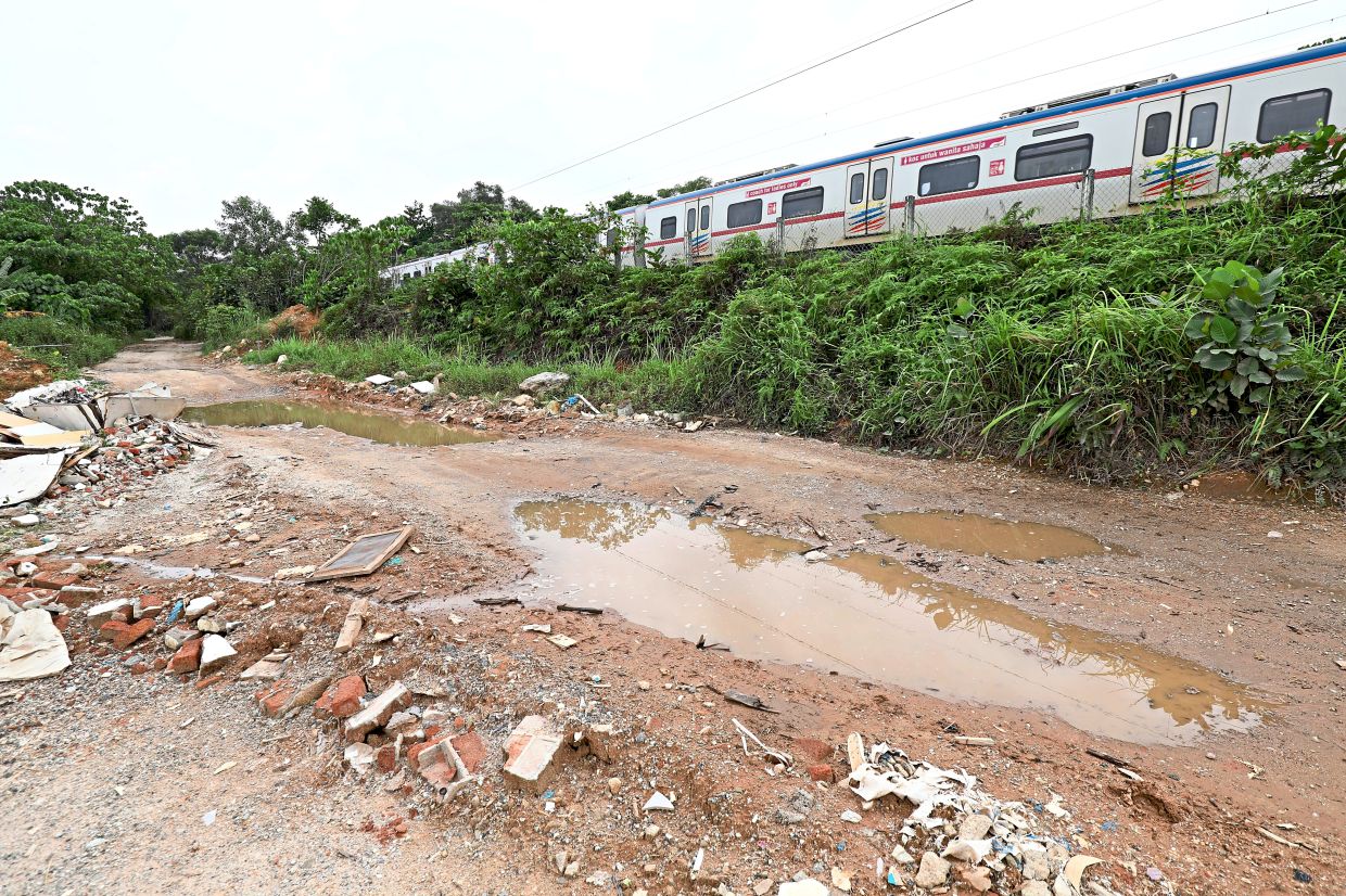 The muddy track which leads to the illegal dumpsite.