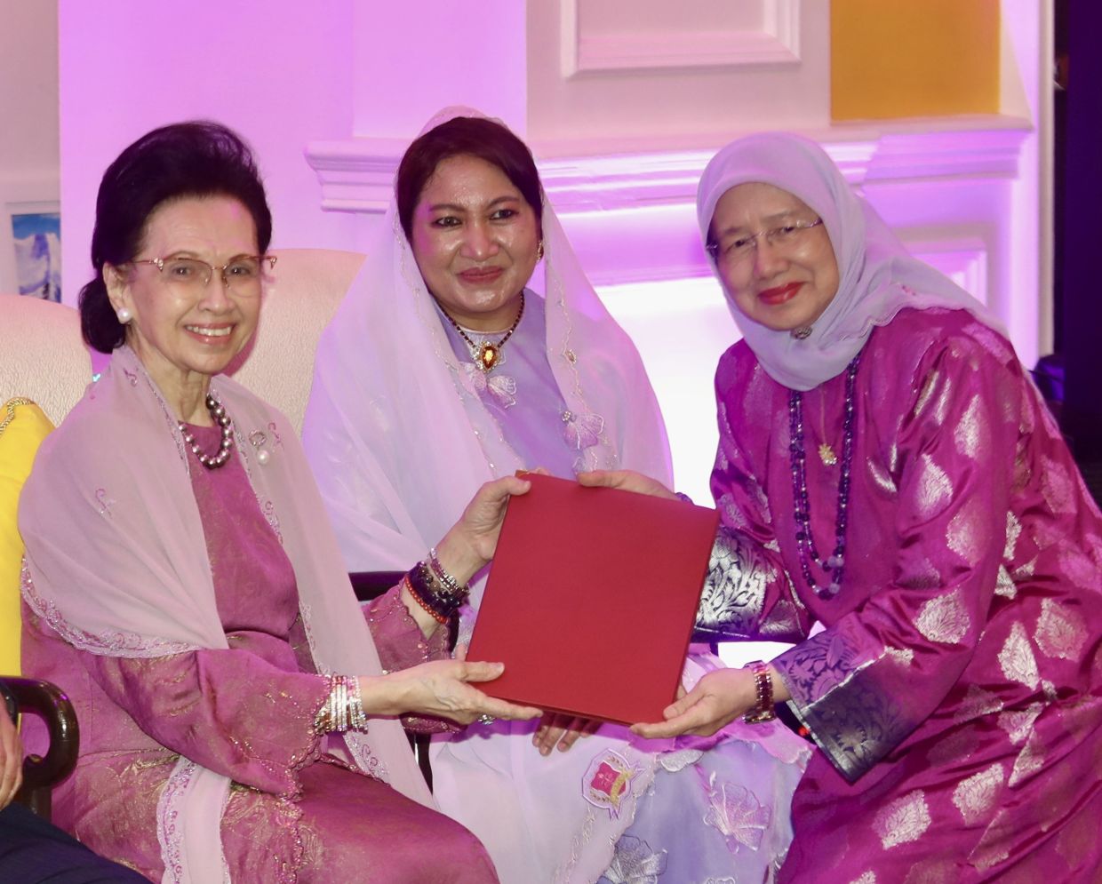 (From left) Tuanku Tengku Fauziah, Tuanku Hajah Lailatul Shahreen and Prof Aini during the awards ceremony. Photo: The Star/Low Lay Phon