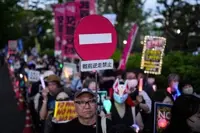 Japanese protesters rally against Takaichi government's military buildup, constitutional revision