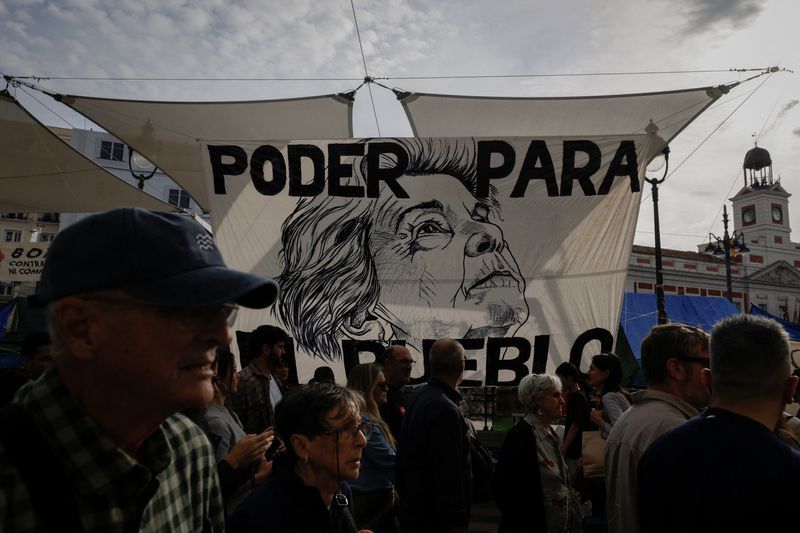 Who's a vulture? Spain struggles to identify culprits in fury over ...