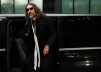 Comedian Russell Brand anally raped me, woman tells UK trial
