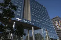 Natixis buys Japan adviser to tap M&A boom