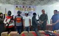 Four rebel fighters surrender, yield guns in Philippines' Maguindanao del Sur
