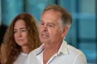 Australia lawmaker loses both legs after 'targeted' attack