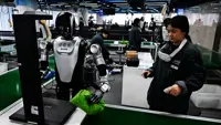 China ‘robot trainers’ fold clothes, wash dishes 200 times a day for up to US$900 a month
