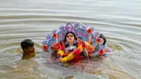 Boat capsizes during Durga idol immersion in India's Kota; two bodies recovered, search on for two cousins