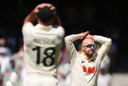 Cricket-Lyon omission in the spotlight as Australia seamers endure tough day