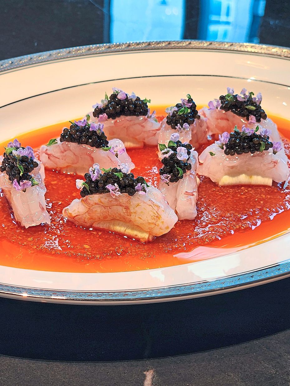 The peony prawns feature supple, delicate prawns in a rich, garlicky sauce.