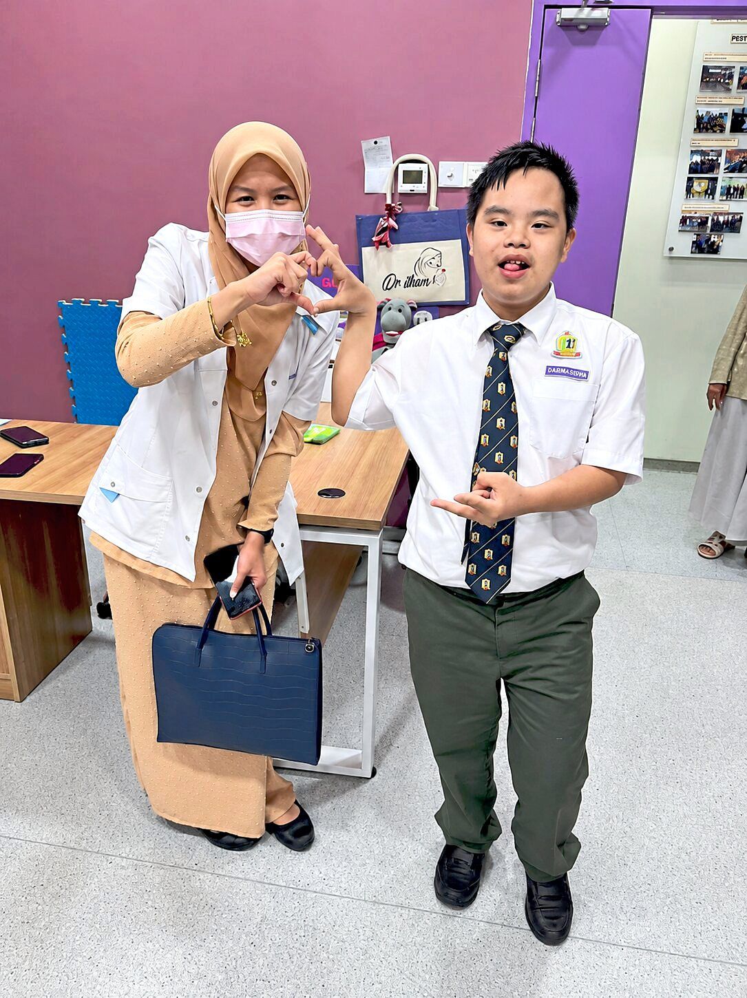 For Dr Ilham (left), one of the most rewarding aspects of her job is seeing children gradually become more comfortable with dental visits.