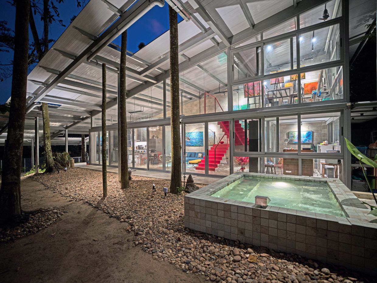 A night view of the Canopy House with the jacuzzi in the foreground. Photo: Ameen Deen