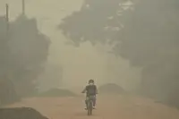 Indonesian police name 11 corporations as suspects in forest fire cases