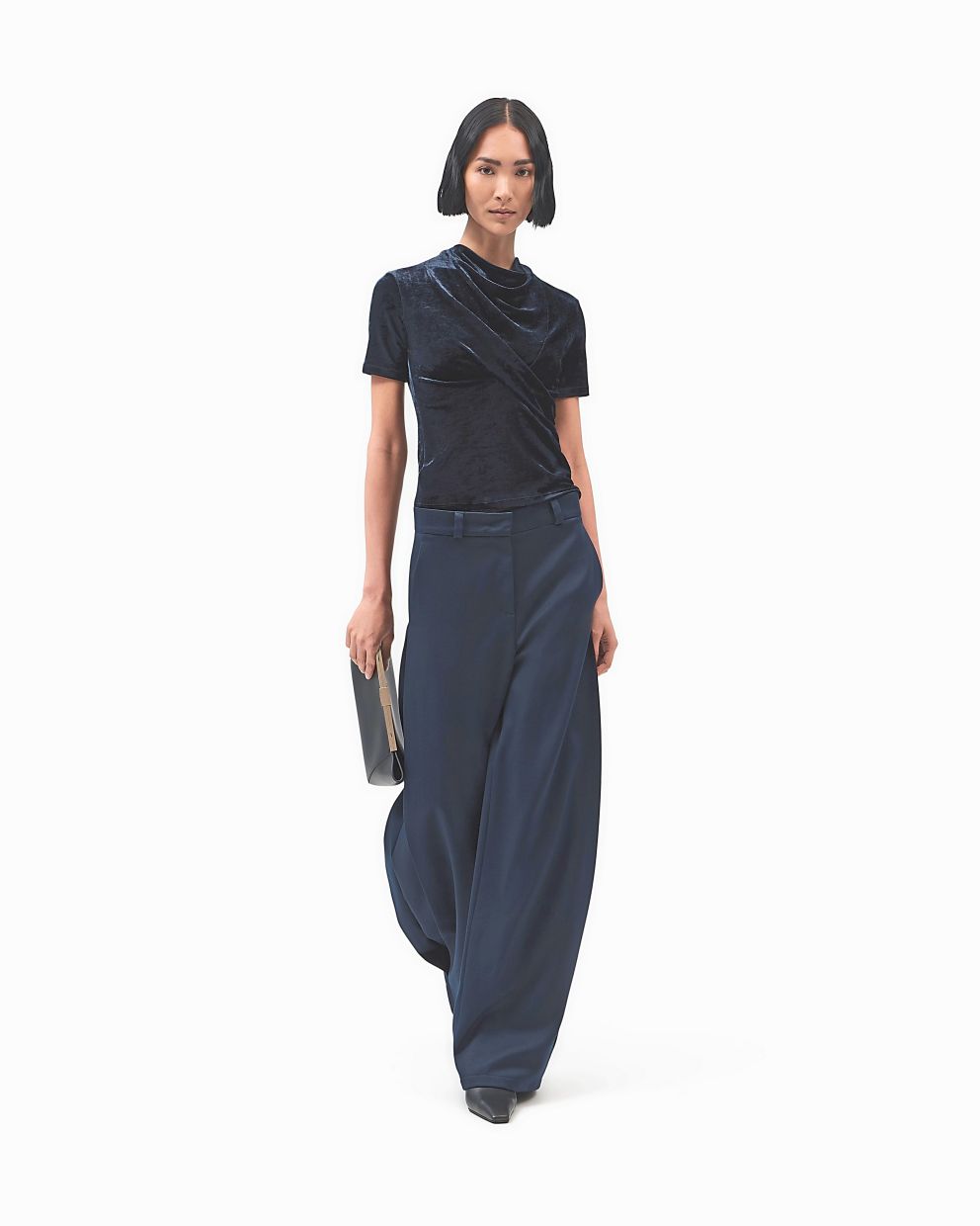 The cascading neckline highlights the beauty of the fabric and the way it catches the light. Photo: Giorgio Armani