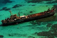 China says it allowed Philippines to resupply warship amid diplomatic tensions