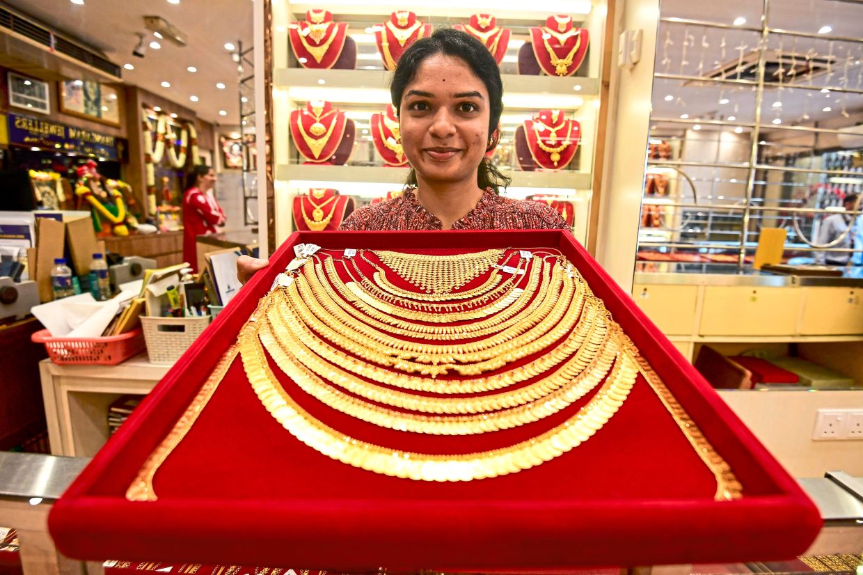 Saranya showing necklaces and other creatively crafted accessories that are popular among women this Deepavali.
