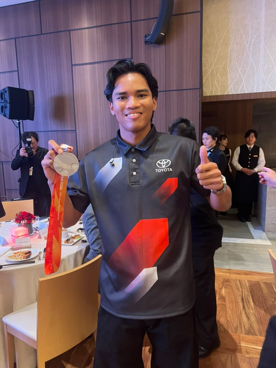 Ammar with the silver medal he won in the men’s T20 400m at the 5th Asian Para Games in Aichi-Nagoya, Japan. Photo: Handout