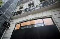 France's luxury stores board up windows ahead of fresh protests