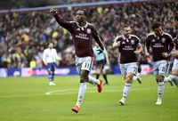 Soccer-Arsenal join Man City at summit after Villa end leaders' perfect start