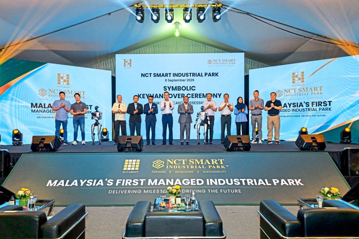 Selangor Menteri Besar Datuk Seri Amirudin Shari (centre) officiating the symbolic key handover for completed Phase 1 units at NCT Smart Industrial Park in Sepang last month. The ceremony marked a major milestone as the park opened its doors for businesses to begin operations within Malaysia’s first certified Managed Industrial Park. — Photo from NCT Group of Companies’ Facebook page