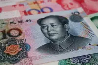 Hong Kong working to boost global banks’ use of yuan trading tools