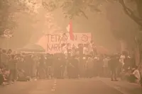 Orange skies, toxic air spark student protests