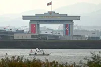 Kim visits China to boost ties