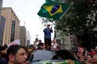 Brazil votes in tight runoff between leftist Lula and Bolsonaro Jr