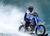 Chinese motorcycle entrepreneur sets world record for riding on water