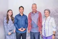 Prince Mateen of Brunei and wife Anisha wear matching blue outfits during their visit to Singapore